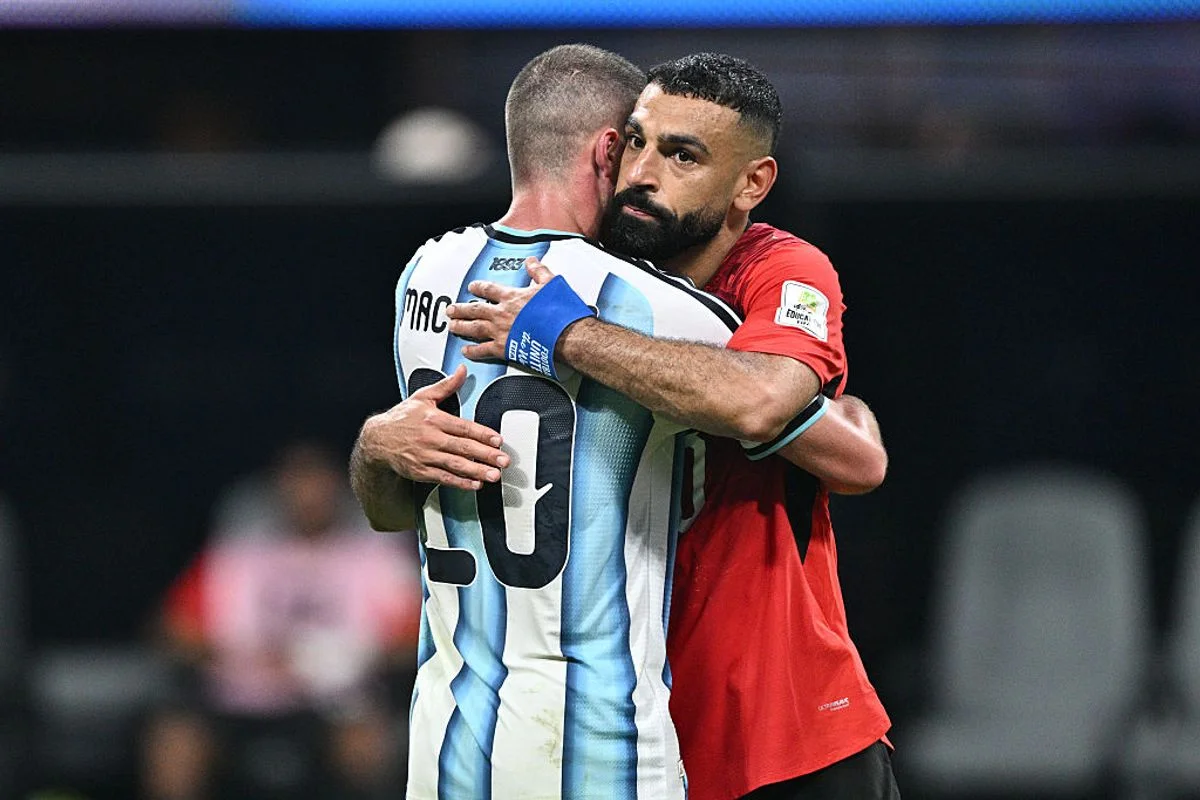 ATLANTA, GEORGIA - JULY 7: Mohamed Salah of Egypt and Alexis Mac Allister of Argentina after the FIFA World Cup 2026 Round of 16 match between Argentina and Egypt at Atlanta Stadium on July 7, 2026 in Atlanta, United States. (Photo by Sebastian Frej/Getty Images)