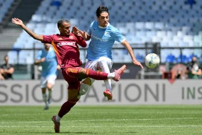 ROME, ITALY - MAY 17: Matteo Cancellieri of SS Lazio compete for the ball with Vinicius Wesley of AS Rom during the Serie A match between AS Roma and SS Lazio at Stadio Olimpico on May 17, 2026 in Rome, Italy. (Photo by Marco Rosi - SS Lazio/Getty Images)