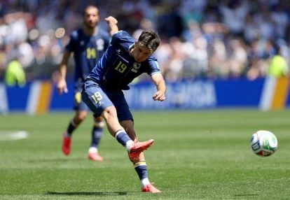 SEATTLE, WASHINGTON - JUNE 24: Kerim Alajbegovic #19 of Bosnia and Herzegovina scores his team's first goal during the FIFA World Cup 2026 Group B match between Bosnia and Herzegovina and Qatar at Seattle Stadium on June 24, 2026 in Seattle, Washington. (Photo by Stu Forster/Getty Images)