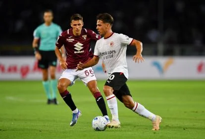 TURIN, ITALY - AUGUST 23: Ardon Jashari of AC Milan runs with the ball during the Serie A match between Torino FC and AC Milan at Stadio Olimpico Grande Torino on August 23, 2026 in Turin, Italy. (Photo by Valerio Pennicino/Getty Images)