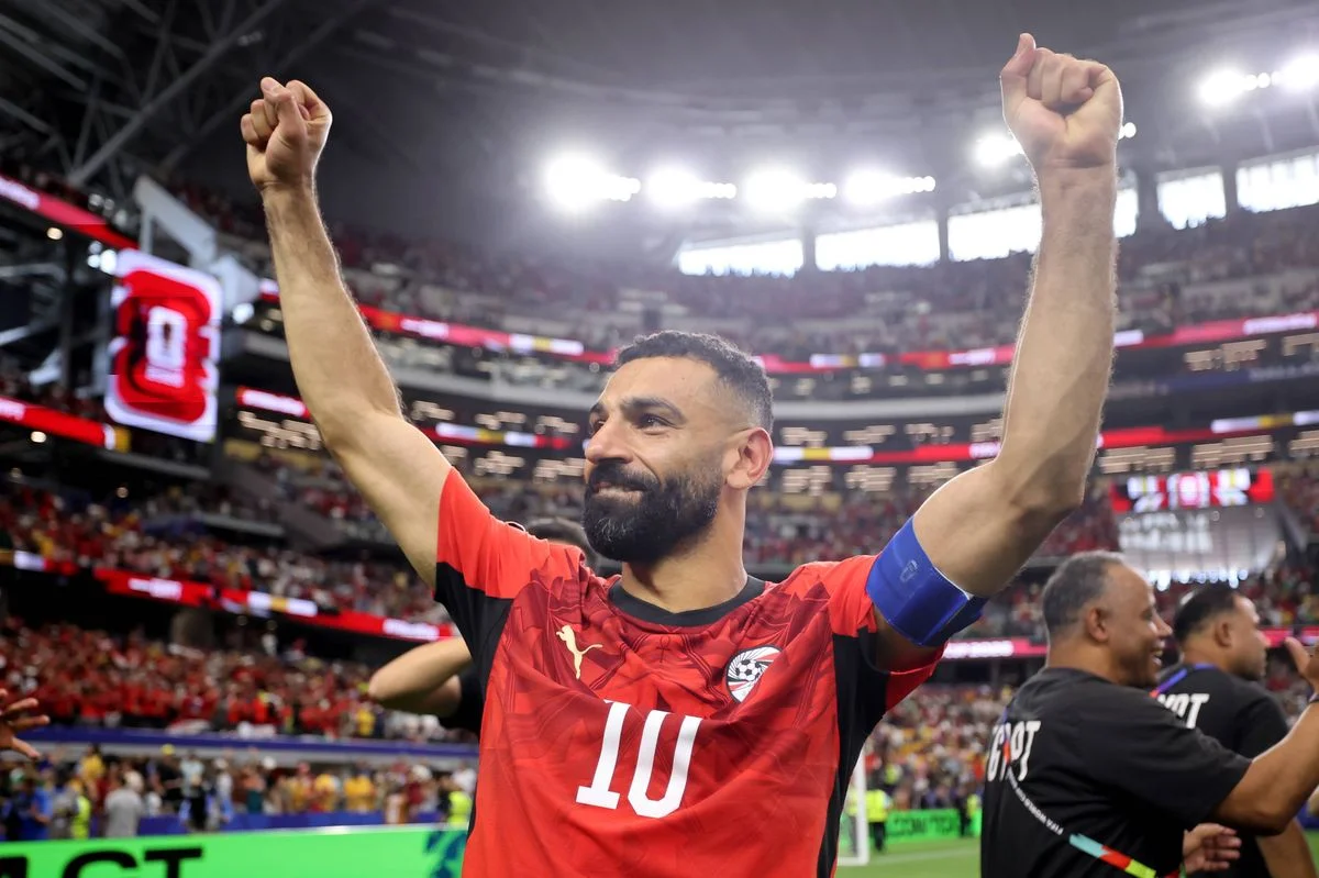 ARLINGTON, TEXAS - JULY 03: Mohamed Salah #10 of Egypt applauds fans after the team's victory through the penalty shootout during the FIFA World Cup 2026 Round of 32 match between Australia and Egypt at Dallas Stadium on July 03, 2026 in Arlington, Texas. (Photo by Hector Vivas - FIFA/FIFA via Getty Images)